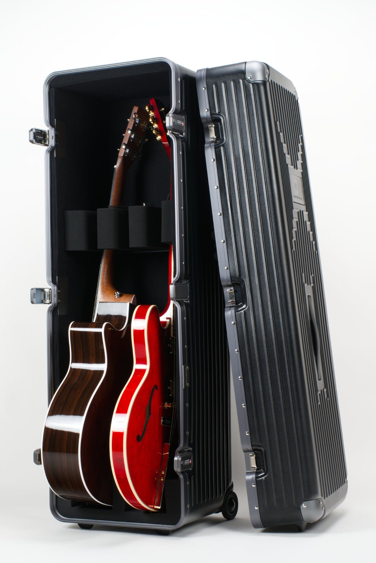 AGX Double Acoustic Case for Flying with a dreadnought acoustic and bright red hollow body Gibson ES-355
