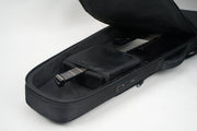Kazane Headless Guitar Gig Bag Open showing an Aristides H/0 guitar